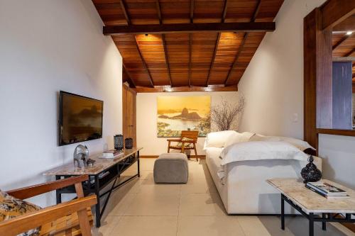 Katil atau katil-katil dalam bilik di Casa Alto Itaipava vista incrível, piscina e hidro