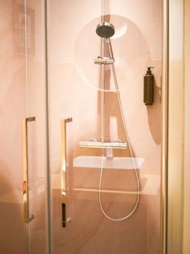 a shower in a bathroom with a sink at Casa Bonnafous in Villesèque-des-Corbières