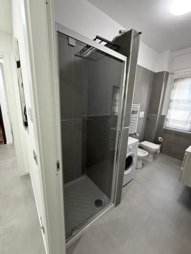 Et badeværelse på Appartamenti Rugacesio 24 - Appartamento A