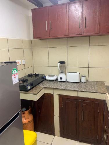 Kuchyň nebo kuchyňský kout v ubytování Fatnaish Tamarind Apartment