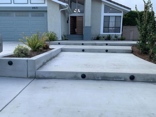 a house with concrete steps in front of a house at CA2 House SoCal Oasis Newly Renovated Game Room in La Palma