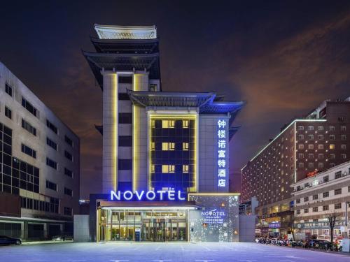 a building with a no hotel sign at night at Novotel Xi'an The Bell Tower in Xi'an