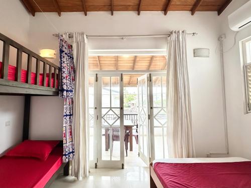 Ένα ή περισσότερα κρεβάτια σε δωμάτιο στο New Olive Villa