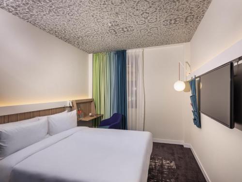 Postel nebo postele na pokoji v ubytování ibis Baku City