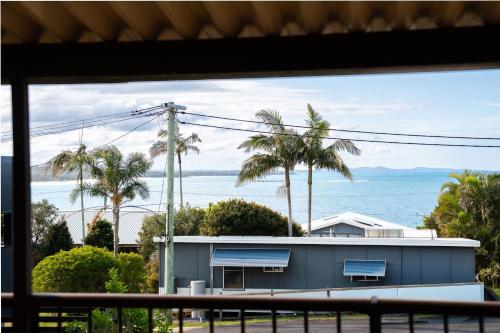 a view of the ocean from a house at Ocean Daze in Woolgoolga