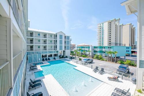 an overhead view of a swimming pool on a building at Sea Glass 214 New Condo ON THE BEACH in Gulf Shores