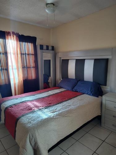 Postel nebo postele na pokoji v ubytování Casa 2121