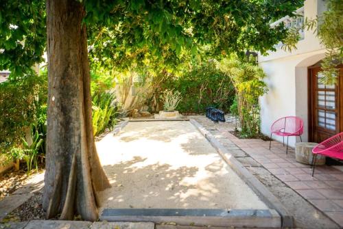 Κήπος έξω από το Oasis luminoso con piscina a un paso del centro