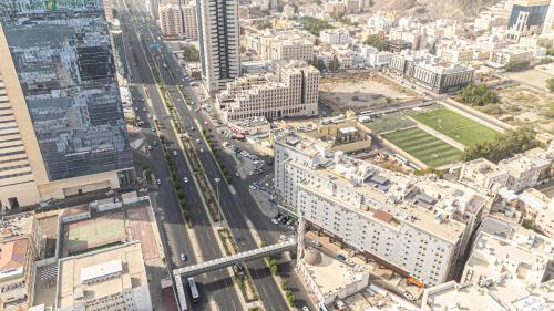 an aerial view of a city with buildings at فندق يقين مكة in Makkah
