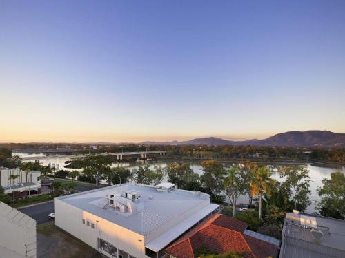 an aerial view of a house with a river at Mercure Rockhampton in Rockhampton