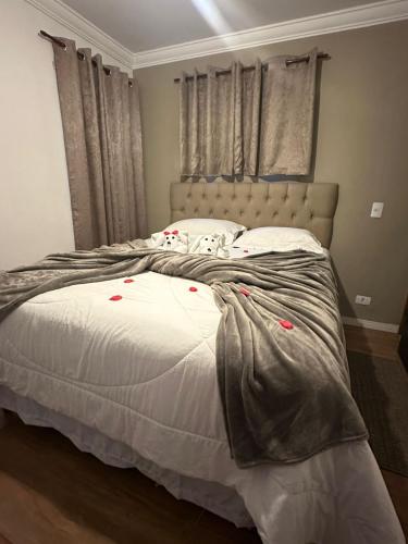 Una cama o camas en una habitación de Tico Pousada
