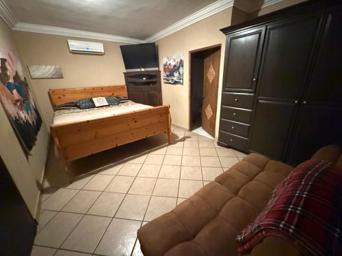 Ένα ή περισσότερα κρεβάτια σε δωμάτιο στο San Felipe Place to stay B&B