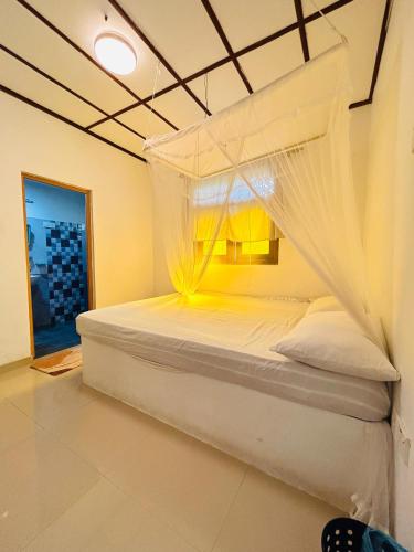 Ένα ή περισσότερα κρεβάτια σε δωμάτιο στο King Garden Villa