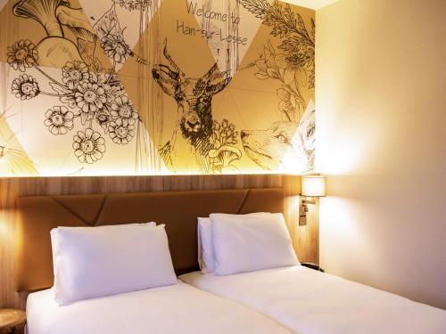 Mercure Han-sur-Lesseにあるベッド