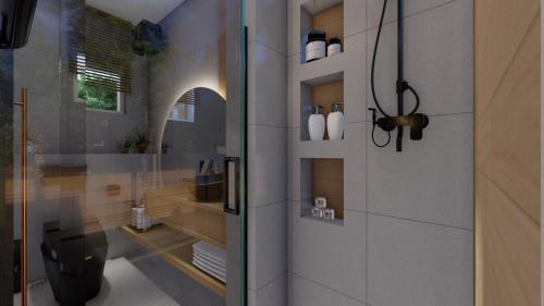 Un baño con lavabo e inodoro en una habitación. en Luxury 3-Bedroom Home in Maitama Abuja, en Abuja
