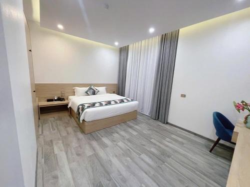 Sala Home Móng Cáiにあるベッド