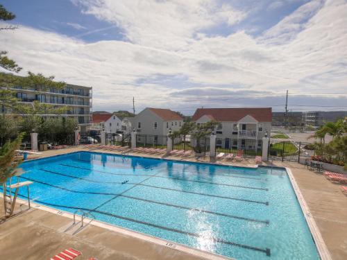 an overhead view of a swimming pool at a hotel at Castle in the Sand in Ocean City