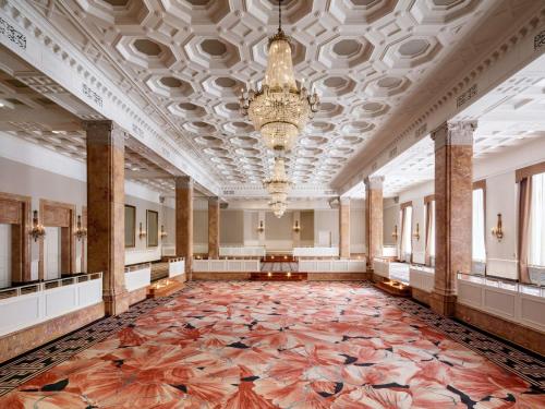 a large room with a large rug on the floor at Fairmont Royal York Hotel in Toronto