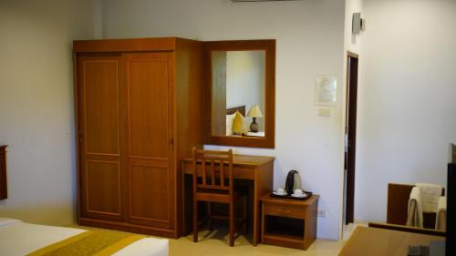 Postel nebo postele na pokoji v ubytování Baan Pitcha บ้านพิชชา