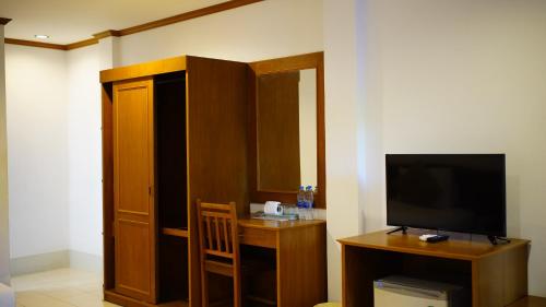 TV a/nebo společenská místnost v ubytování Baan Pitcha บ้านพิชชา