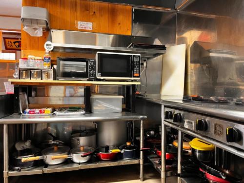 Cucina o angolo cottura di Izakaya inn "Tsubaki" - Vacation STAY 14130