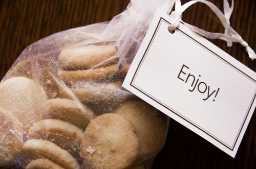 a bag of donuts with a sign that reads enjoy at Chateau La Chaire in Rozel