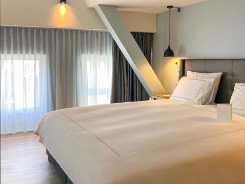 Katil atau katil-katil dalam bilik di Swissôtel Amsterdam