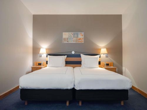 Katil atau katil-katil dalam bilik di Swissôtel Amsterdam