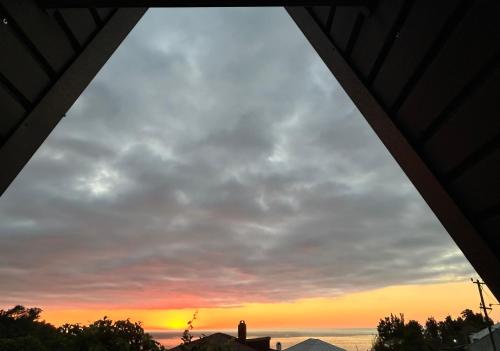 a sunset view from the balcony of a house at Rakushki's house 2 in K'obulet'i