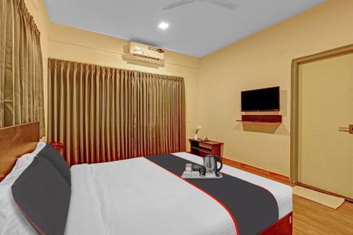 Hotel O Manyata Stay-Inにあるテレビまたはエンターテインメントセンター