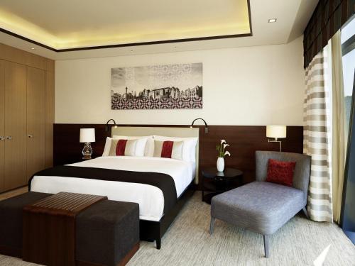 Кровать или кровати в номере Fairmont Baku, Flame Towers