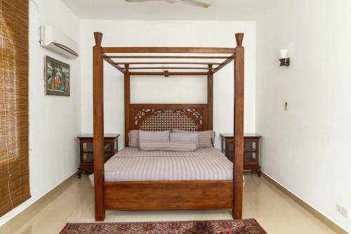 Katil atau katil-katil dalam bilik di SkyPort Villa Negombo