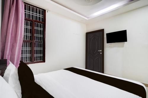 Cama o camas de una habitación en Super Hotel O NIIT University Neemrana