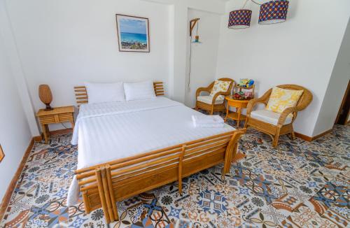 Una cama o camas en una habitación de Hotel De Condor