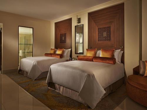 Un ou plusieurs lits dans un hébergement de l'établissement Fairmont The Palm