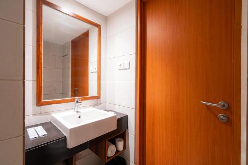 Un baño de Swiss-Belexpress Kuta Legian