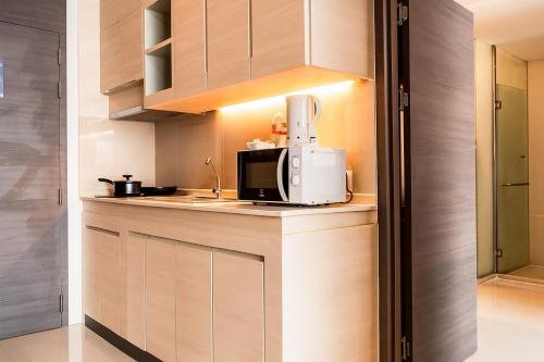 Kuchyň nebo kuchyňský kout v ubytování Jasmine Resort Bangkok