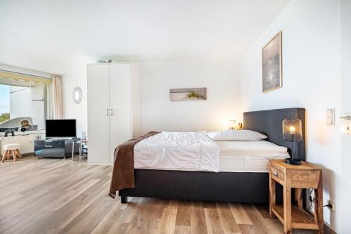 Postel nebo postele na pokoji v ubytování Apartementhaus Lord Nelson