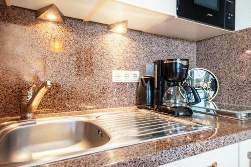 Kuchyň nebo kuchyňský kout v ubytování Apartementhaus Lord Nelson