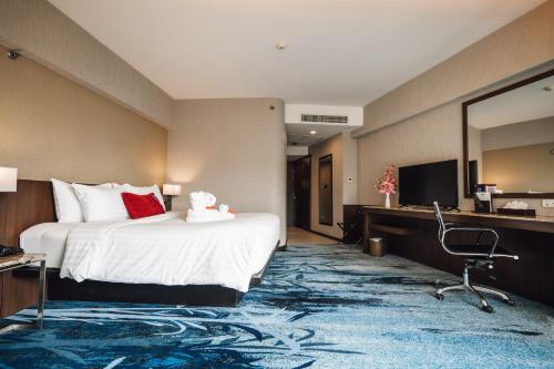 Μια τηλεόραση ή/και κέντρο ψυχαγωγίας στο Ambassador Hotel Bangkok