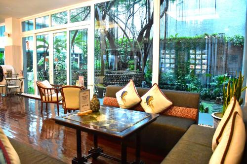 Χώρος καθιστικού στο Ambassador Hotel Bangkok