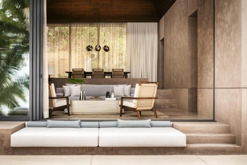 a rendering of a living room with a couch at One&Only Mandarina in Lo de Marcos