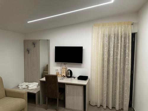 Televisyen dan/atau pusat hiburan di bed e breakfast da Giada