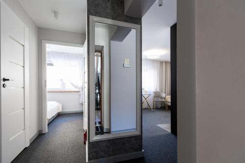 Postel nebo postele na pokoji v ubytování Apartment GREY Comfort