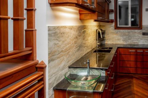 Η κουζίνα ή μικρή κουζίνα στο Charleston Homestay
