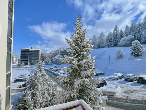 Charmant studio aux Ménuires pour 2, pied des pistes, proche commerces, équipements modernes