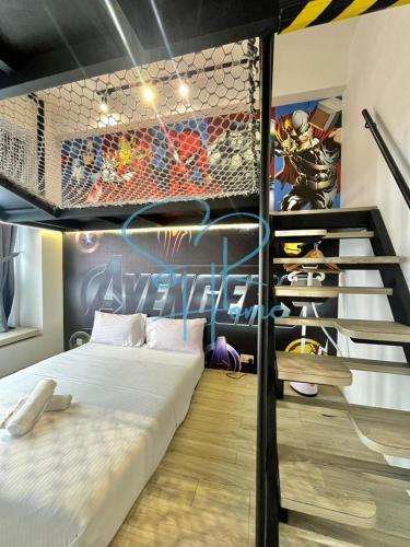 a bedroom with a bunk bed with a staircase at Sunway GRID by SR Home in Kampong Pendas