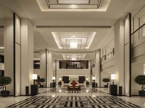 a rendering of a lobby of a hotel at Fairmont Wuhan in Wuhan