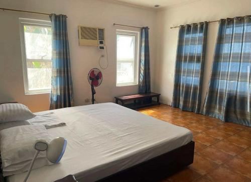 Ένα ή περισσότερα κρεβάτια σε δωμάτιο στο LU Paraoir Sunset House