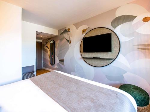 TV/Unterhaltungsangebot in der Unterkunft ibis Styles Rennes Cesson